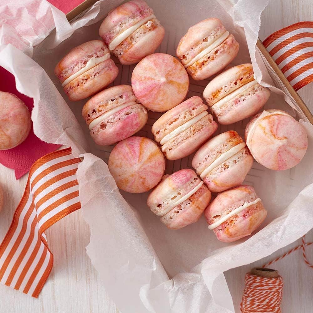 https://blog.wilton.com/wp-content/uploads/sites/2/2016/07/pink-marbled-french-macarons.jpg