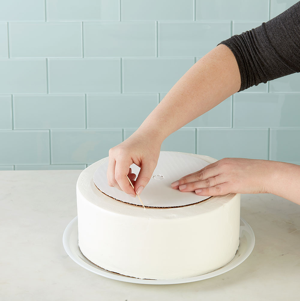 How to Cover a Cake Board with Fanci Foil - Wilton