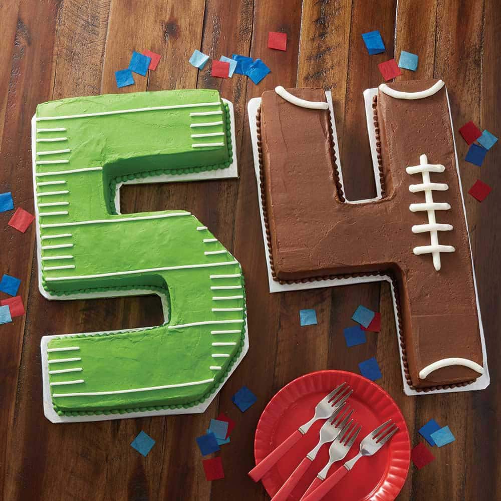 number 54 shaped cake with football field design