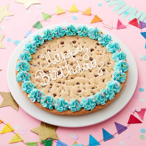 Giant Happy Birthday chocolate chip cookie, with a blue buttercream border