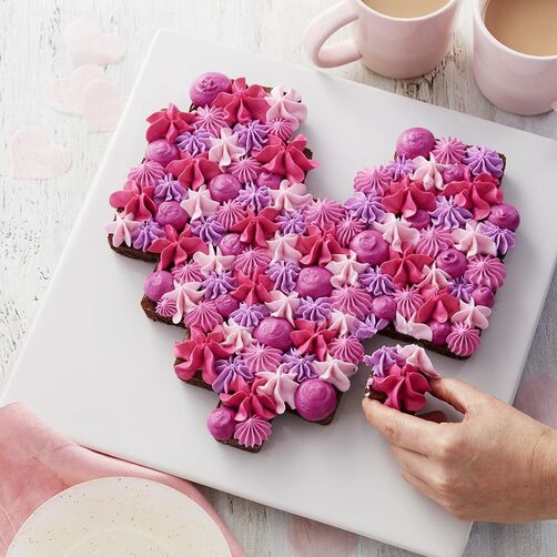 Pull-apart heart shaped brownies with shades of pink frosting on top