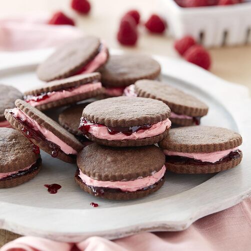 Chocolate shortbread cookies with raspberry jam filling