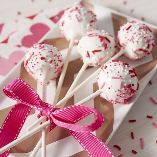 Valentine's Day cake pops with pink, white, and red sprinkles