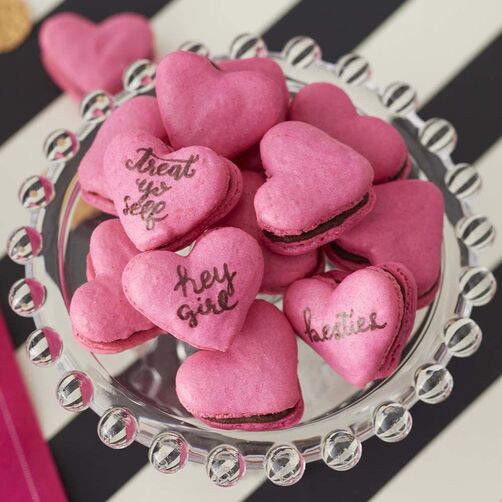 Pink, heart-shaped macarons