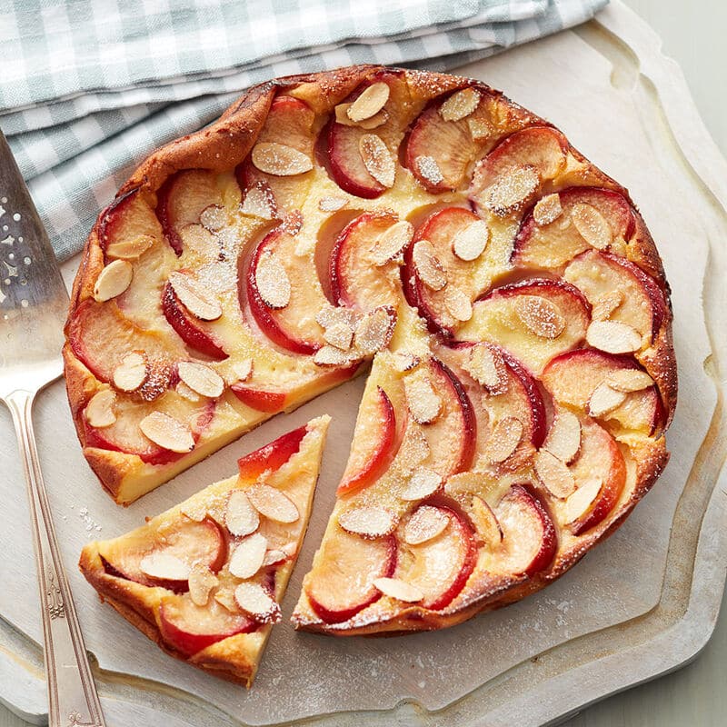 Plum clafoutis recipe, a plum tart topped with almonds