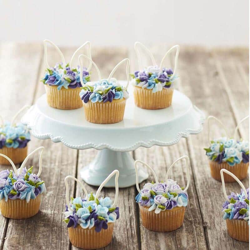 Blue floral cupcakes topped with white Candy Melt bunny ears - Easter dessert ideas