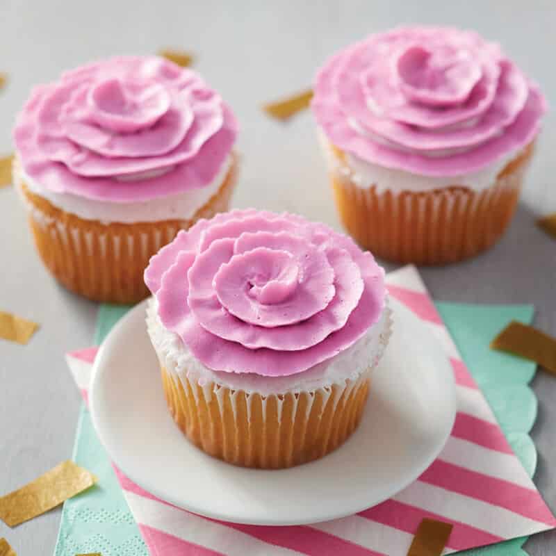 cupcakes frosted with buttercream blooming ribbon roses