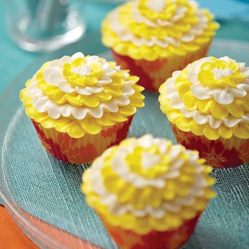 cupcakes frosted with buttercream to look like a daffodil