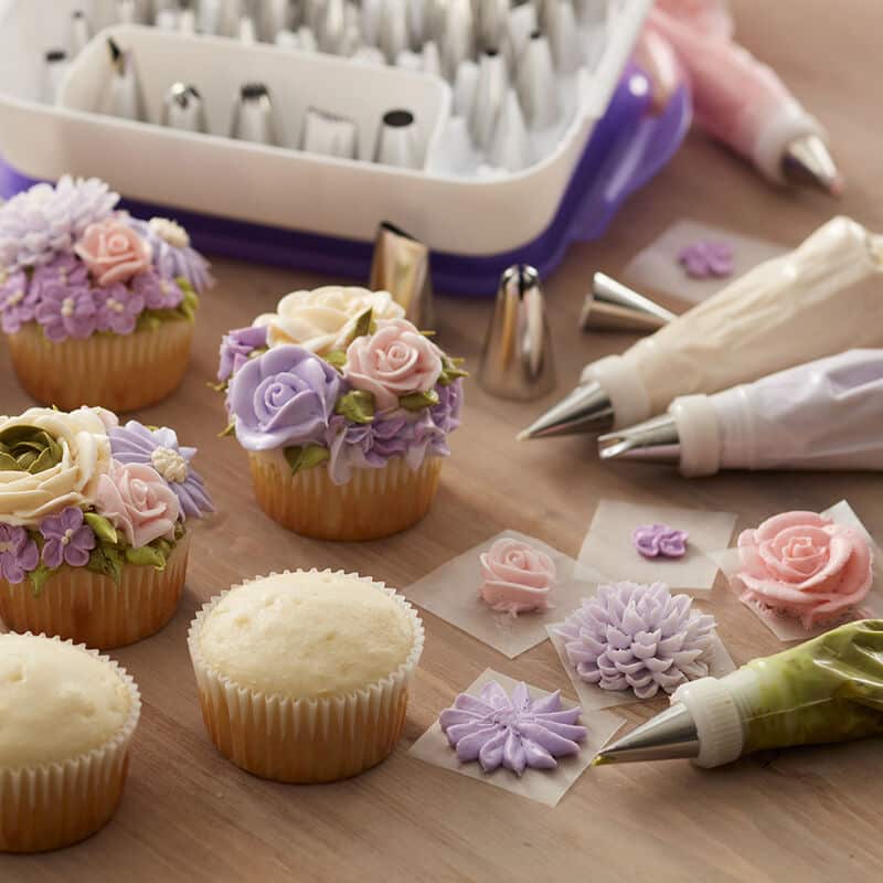 cupcakes decorated with pastel color flowers