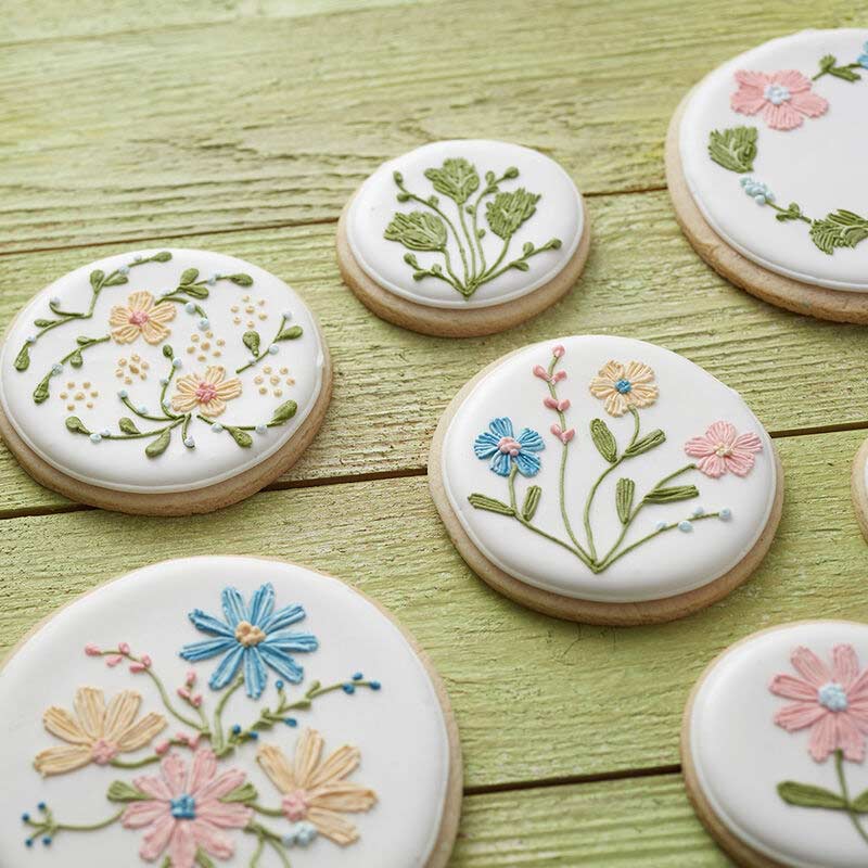 cookies decorated with flowers and vines