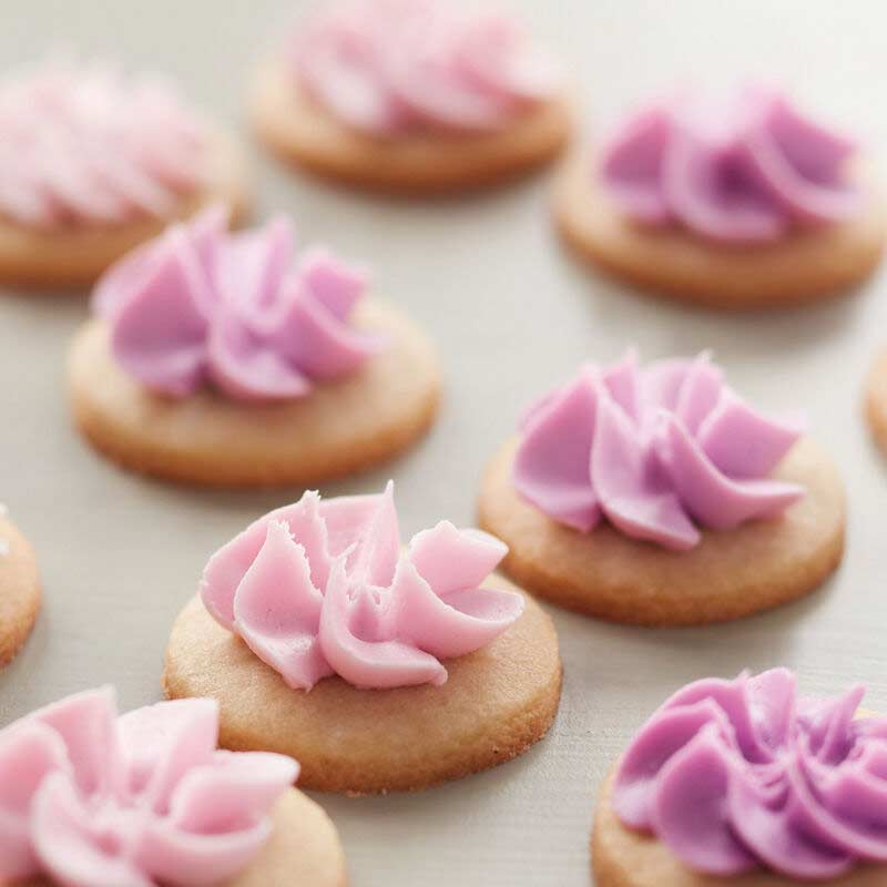 cookies with a piped violet topping