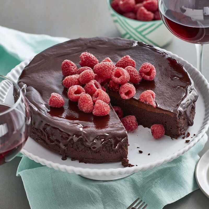 flourless chocolate cake topped with raspberries