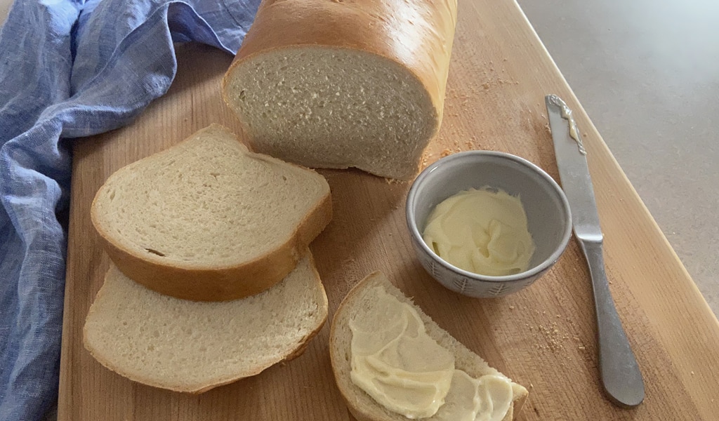 sliced and buttered bread