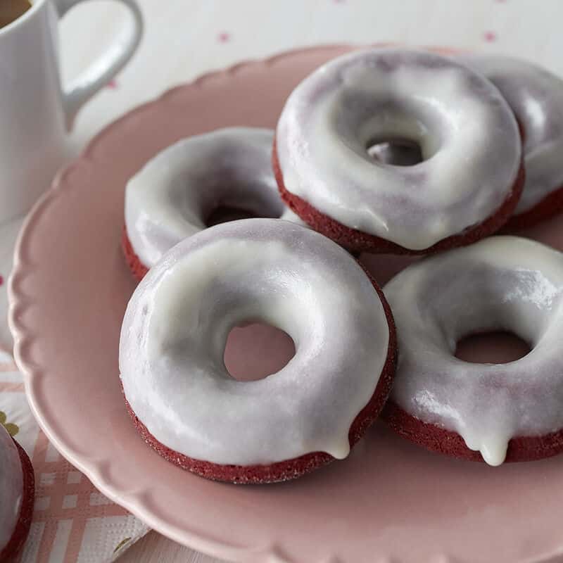 red velvet cake donuts with frosting