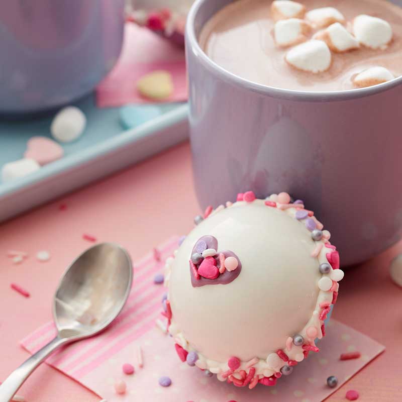 https://blog.wilton.com/wp-content/uploads/sites/2/2021/12/candy-melts-hot-cocoa-bomb.jpg