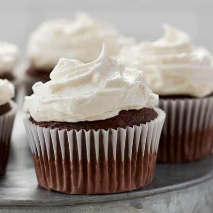 chocolate cupcakes with stabilized whipped cream frosting